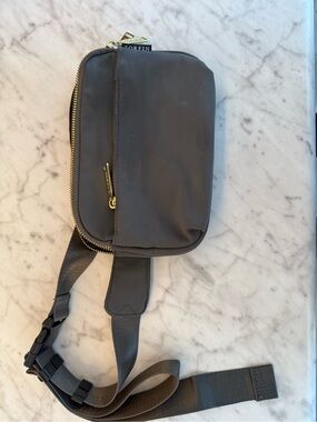 Gray Crossbody Sling Bag with Gold Zippers